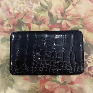 Faux leather flat wallet, 4 credit card slots, ID pocket, zipper for coins.